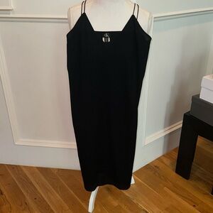 Simple black dress with spaghetti straps